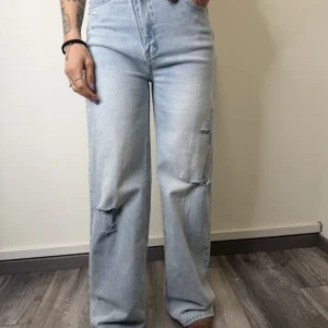 JEANS ASSIMETRICO CON STRAPPI SUSYMIX